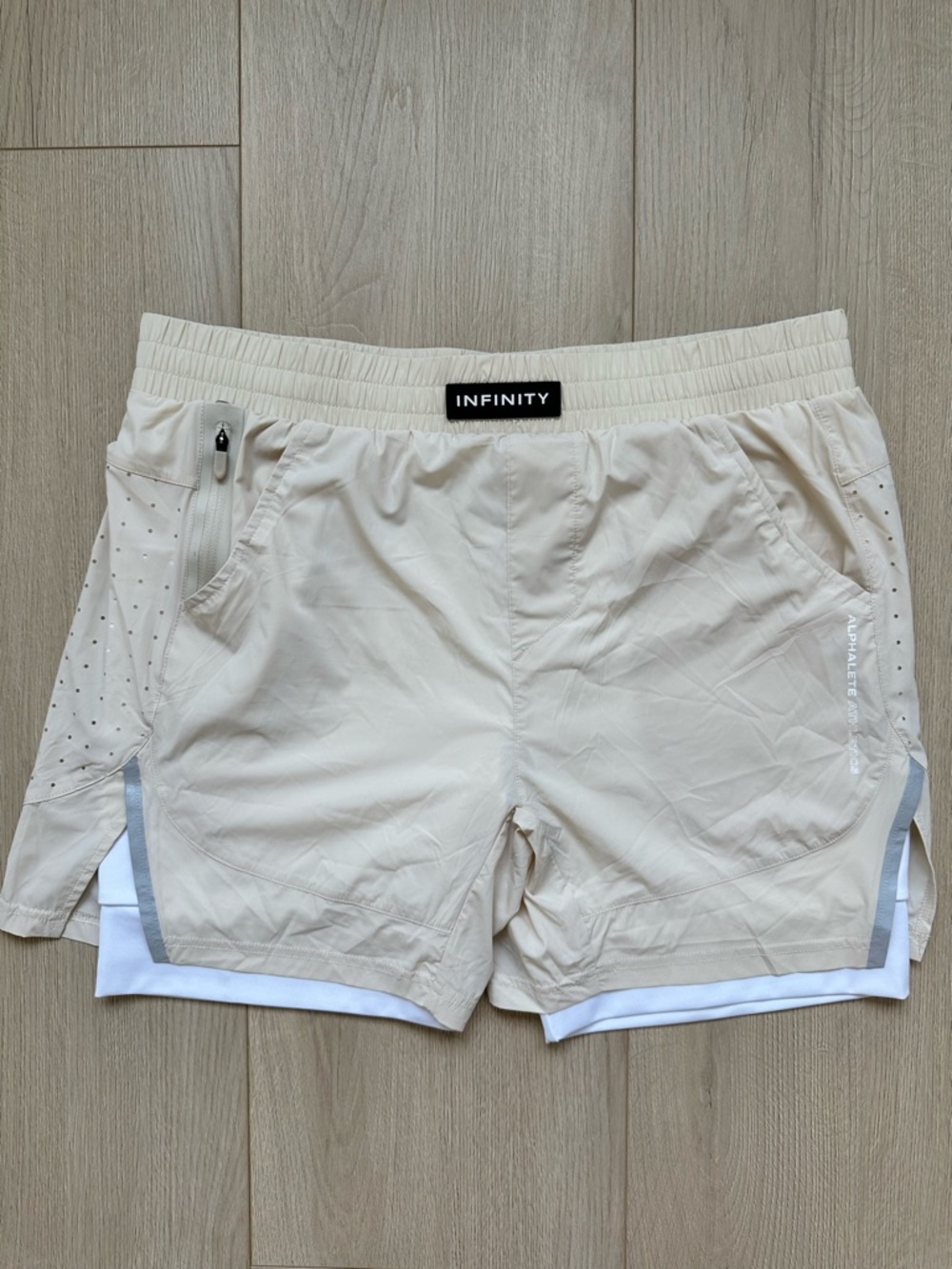 Alphalete Infinity Beige Athletic Shorts with White Liner